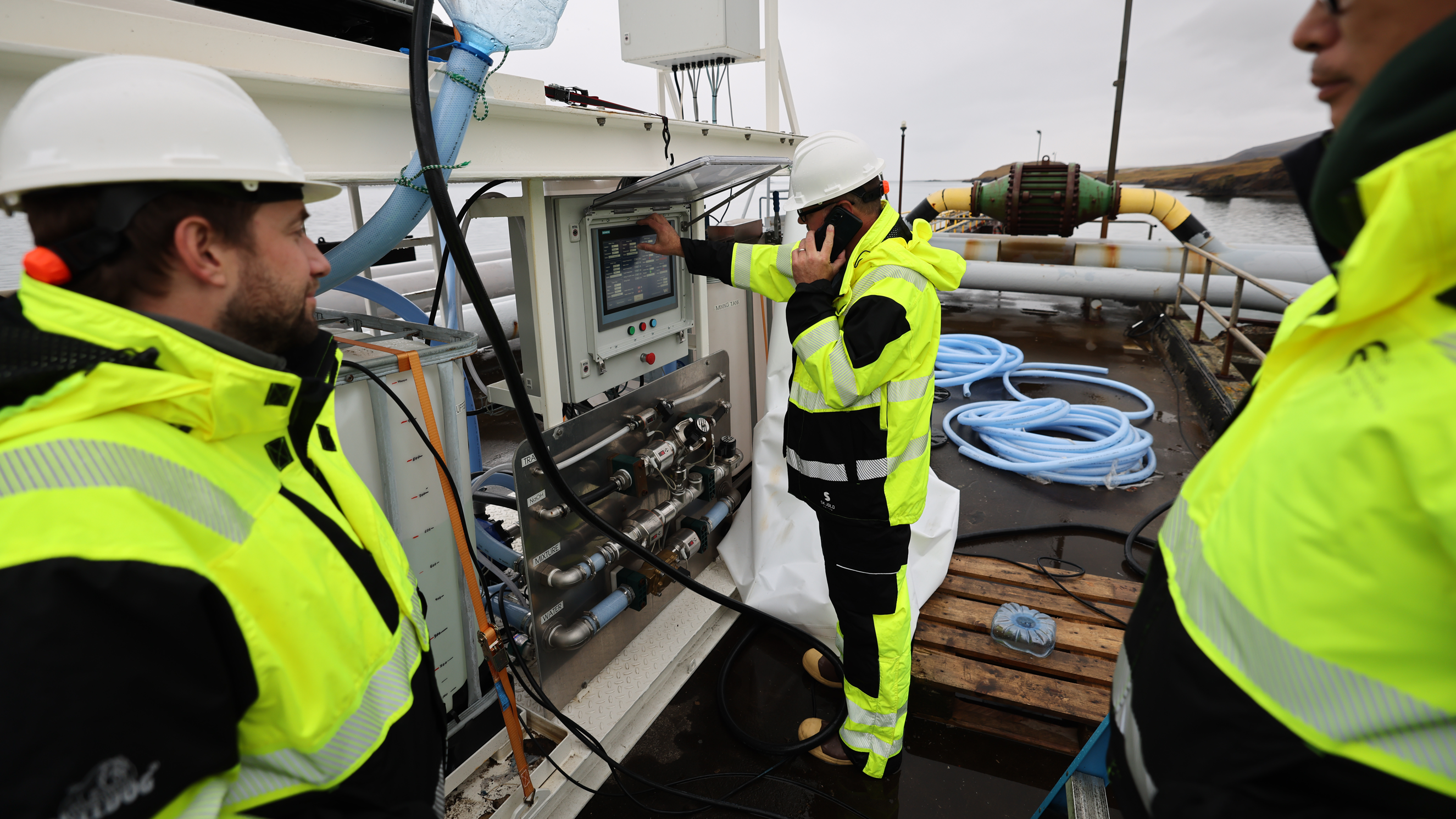A modular release and monitoring system is tested before a dye study of ocean currents in Iceland. (Danny Gawlowski / Carbon to Sea)